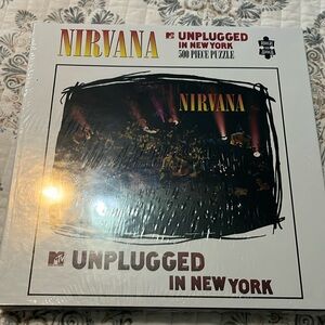 Sold. NWT Nirvana unplugged in New York 500 piece puzzle